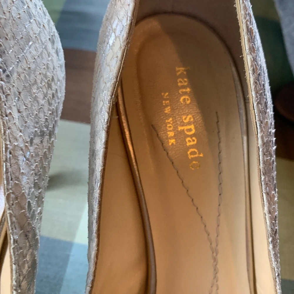Kate soade silver bow shoes. Worn about 5 times. Mark’s on bottom but great conf